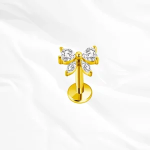 Piercing labret en titane doré "le petit noeud brillant" motif nœud papillon serti de cristaux marquise et zircon central pour tragus ou hélix