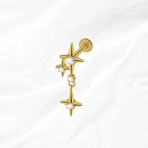 Piercing labret en titane doré "la constellation" avec pendentif cascade de trois étoiles serties de zircons pour hélix ou conch