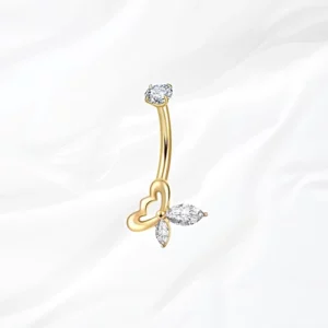 Piercing de nombril banane en titane doré "l'envolée du papillon" motif papillon asymétrique avec aile ajourée et cristaux marquise