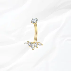 Piercing de nombril banane en titane doré "la marquise renversée" orné d'un éventail de cinq cristaux marquise clairs et zircon rond supérieur