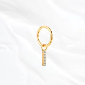 Piercing en titane doré en forme de rectangle avec des zircons