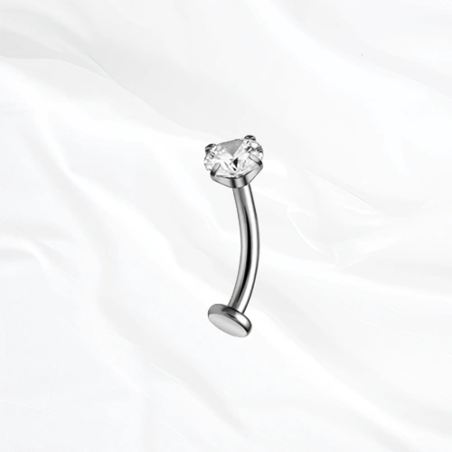piercing nombril en titane argenté, barre courbée sertie d'un zircon à griffes