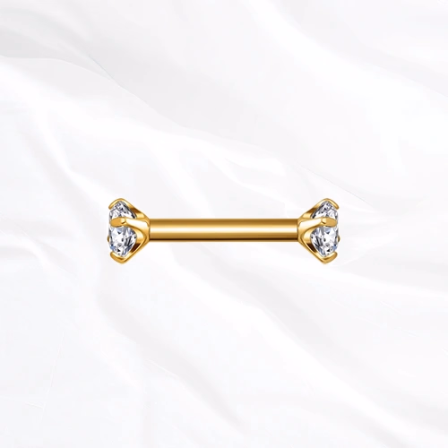 Barre droite en titane doré La Barre Sertie, un zircon rond à griffes à chaque extrémité, surélevé pour laisser passer la lumière