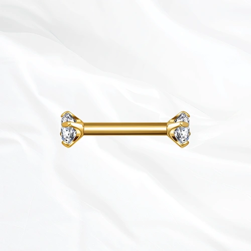 Barre droite en titane doré La Barre Sertie, un zircon rond à griffes à chaque extrémité, surélevé pour laisser passer la lumière