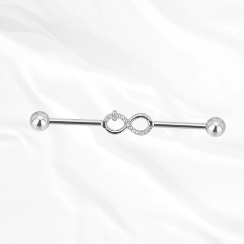 Barre industrielle en titane argenté L’Infini, symbole de l’infini serti au centre, ses deux boucles entièrement pavées