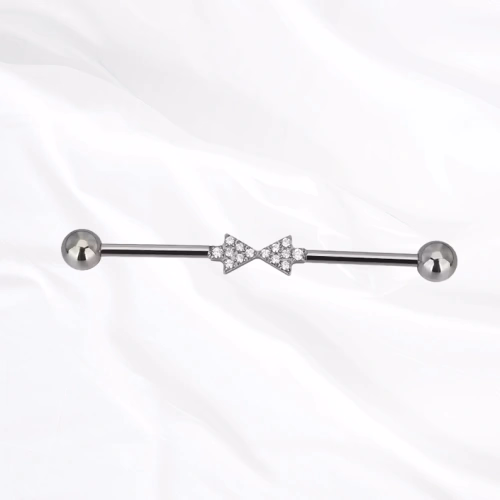 Barre industrielle en titane Les Retrouvailles V3, nœud papillon pavé de zircons sur une barre à finition anthracite mate