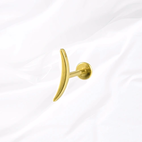 Labret en titane doré La Courbure Simple, arc de titane plein épousant le bord du cartilage