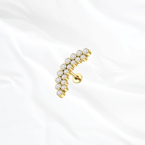 Labret en titane doré La Grande Grappe, arc pavé sur deux rangs de zircons décalés comme les grains d’une grappe