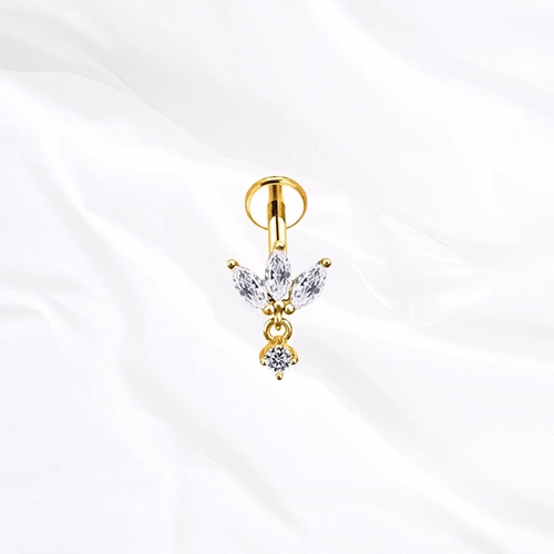 Labret en titane doré La Marquise Pendentif, trois zircons marquise en éventail sous lesquels un zircon rond se balance