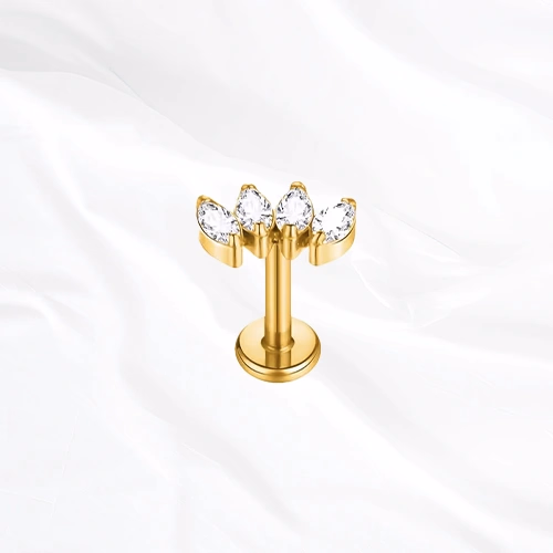 Labret en titane doré La Marquise Royale, quatre zircons marquise alignés en couronne, pointes vers le haut et presque jointifs