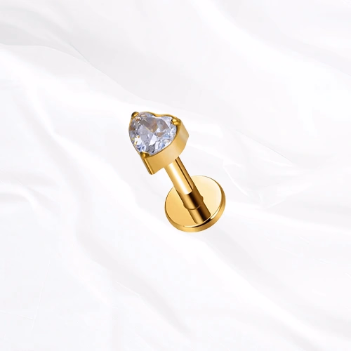 Labret en titane doré Le Cœur, zircon taille cœur tenu par des griffes fines aux trois points de sa silhouette