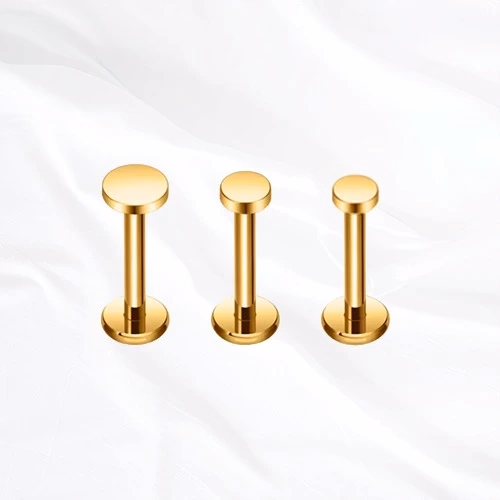 Trois labrets en titane Le Commun dorés, plateau plat rond en 2,5, 3 et 4 mm