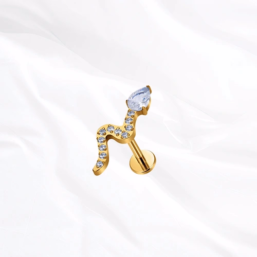 Labret en titane doré Le Serpent V2, serpent au corps pavé de petits zircons et à la tête formée d’un zircon poire