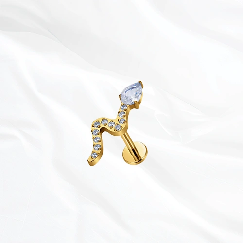 Labret en titane doré Le Serpent V2, serpent au corps pavé de petits zircons et à la tête formée d’un zircon poire