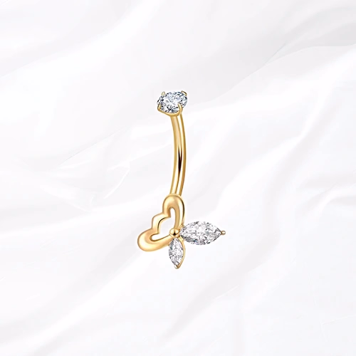 Piercing de nombril banane en titane doré L’Envolée du Papillon, papillon aux ailes de zircons marquise monté en biais