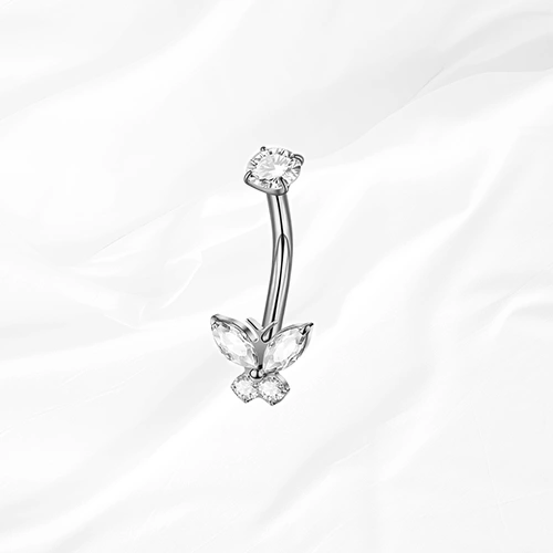 Piercing de nombril banane en titane argenté Le Grand Monarque, papillon aux ailes supérieures allongées serti de zircons