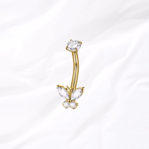 Piercing de nombril banane en titane doré Le Grand Monarque, papillon aux ailes supérieures allongées serti de zircons