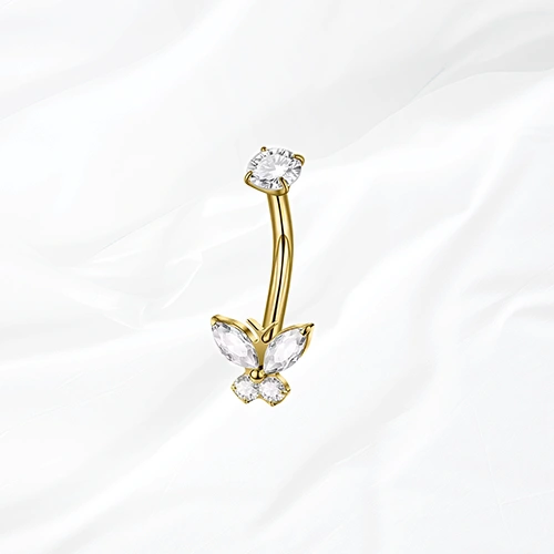 Piercing de nombril banane en titane doré Le Grand Monarque, papillon aux ailes supérieures allongées serti de zircons