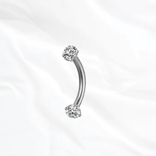 Barre courbée en titane argenté La Courbe Sertie, un zircon rond serti à chaque extrémité