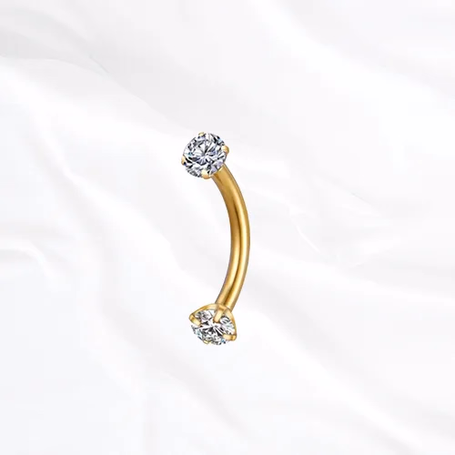 Barre courbée en titane doré La Courbe Sertie, un zircon rond serti à chaque extrémité