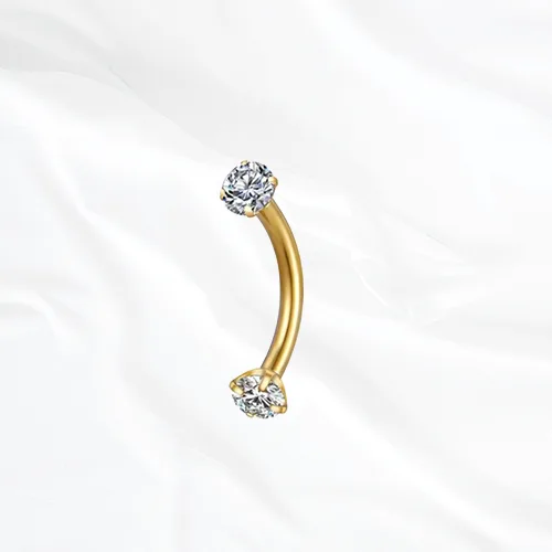 Barre courbée en titane doré La Courbe Sertie, un zircon rond serti à chaque extrémité