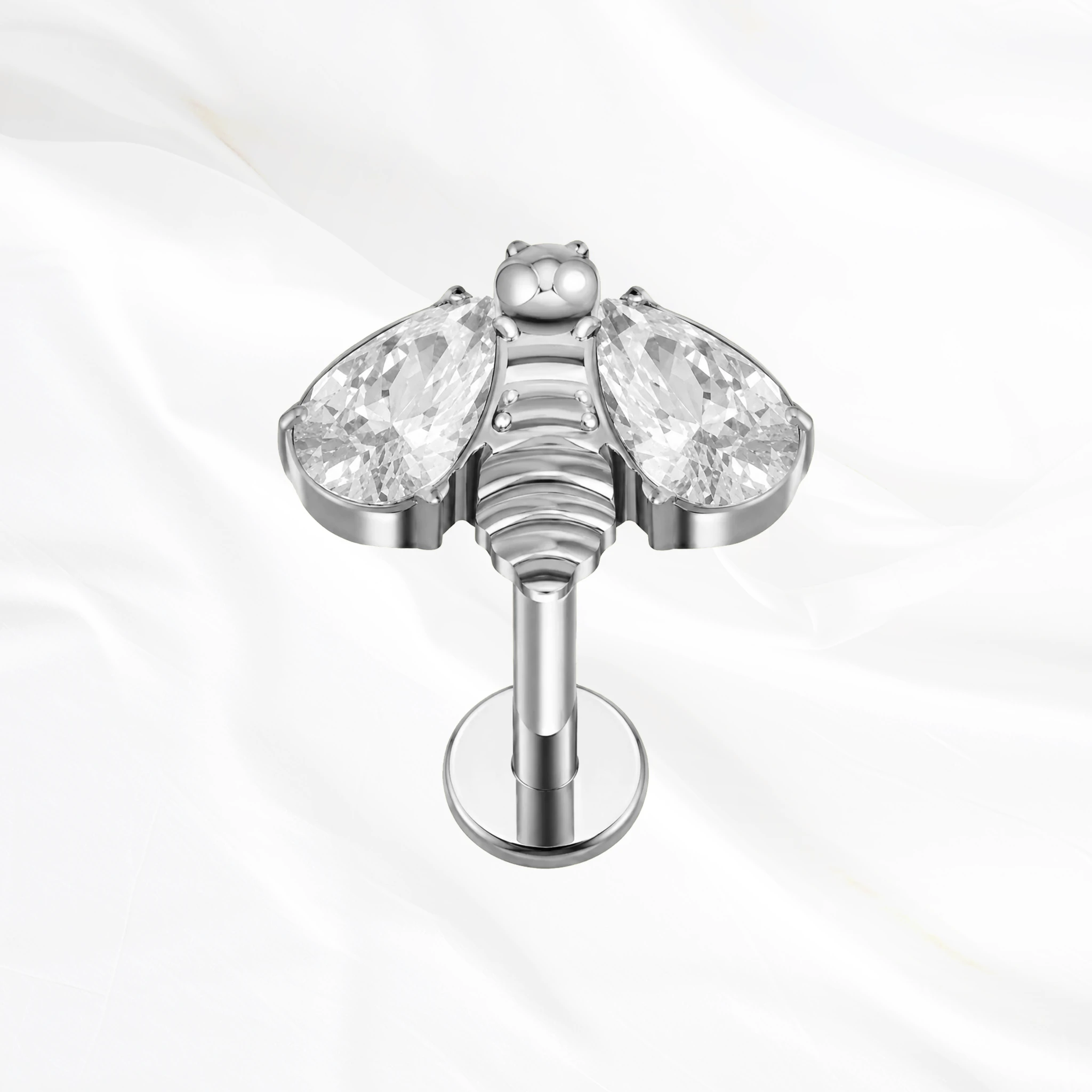 Labret en titane argenté L’Abeille Brillante, abeille au corps strié et ailes en zircons poire