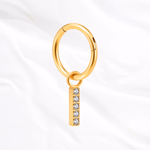 Piercing en titane doré en forme de rectangle avec des zircons