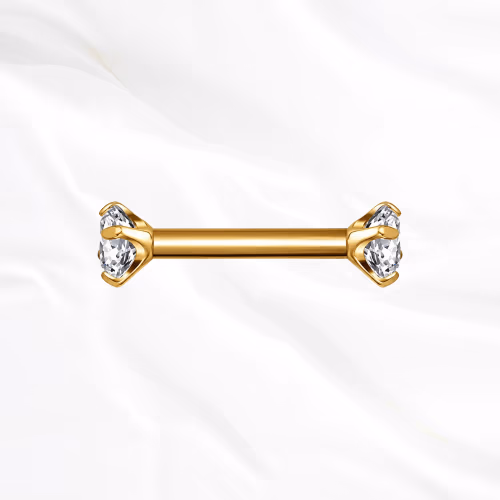 Barre droite en titane doré La Barre Sertie, un zircon rond à griffes à chaque extrémité, surélevé pour laisser passer la lumière