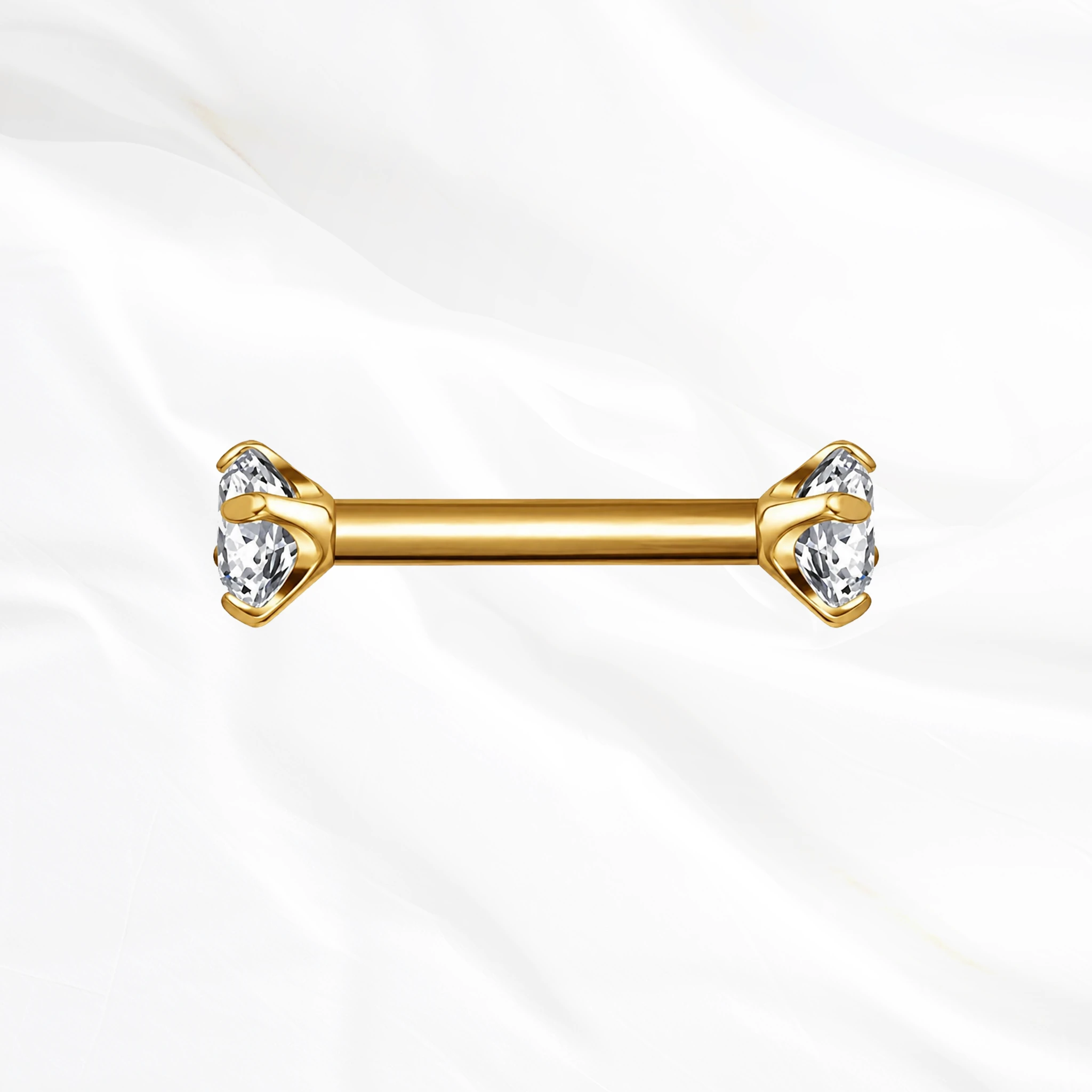 Barre droite en titane doré La Barre Sertie, un zircon rond à griffes à chaque extrémité, surélevé pour laisser passer la lumière