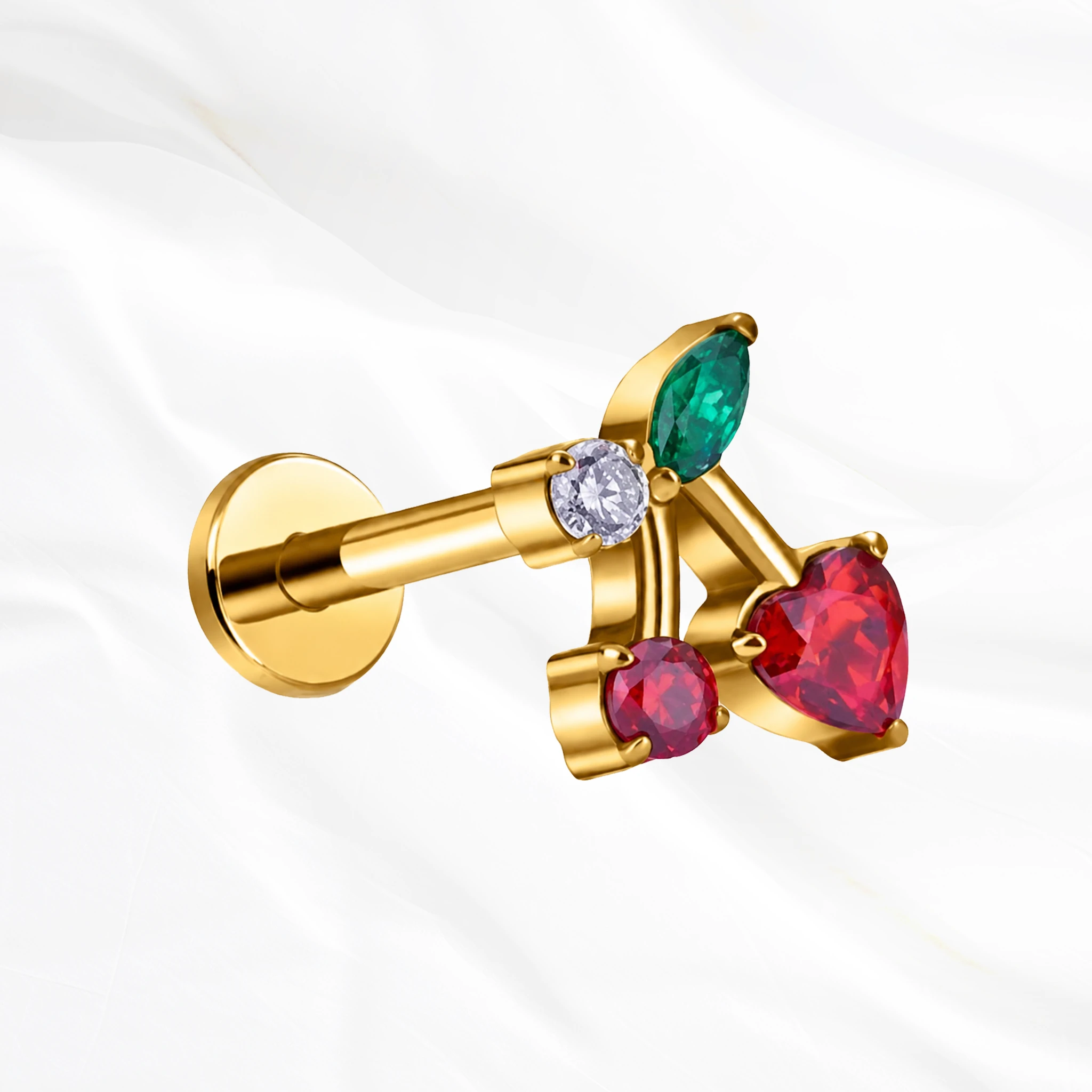 Labret en titane doré La Cerise, deux cerises serties de zircons rouges et feuille verte