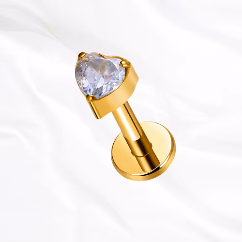 Labret en titane doré Le Cœur, zircon taille cœur tenu par des griffes fines aux trois points de sa silhouette