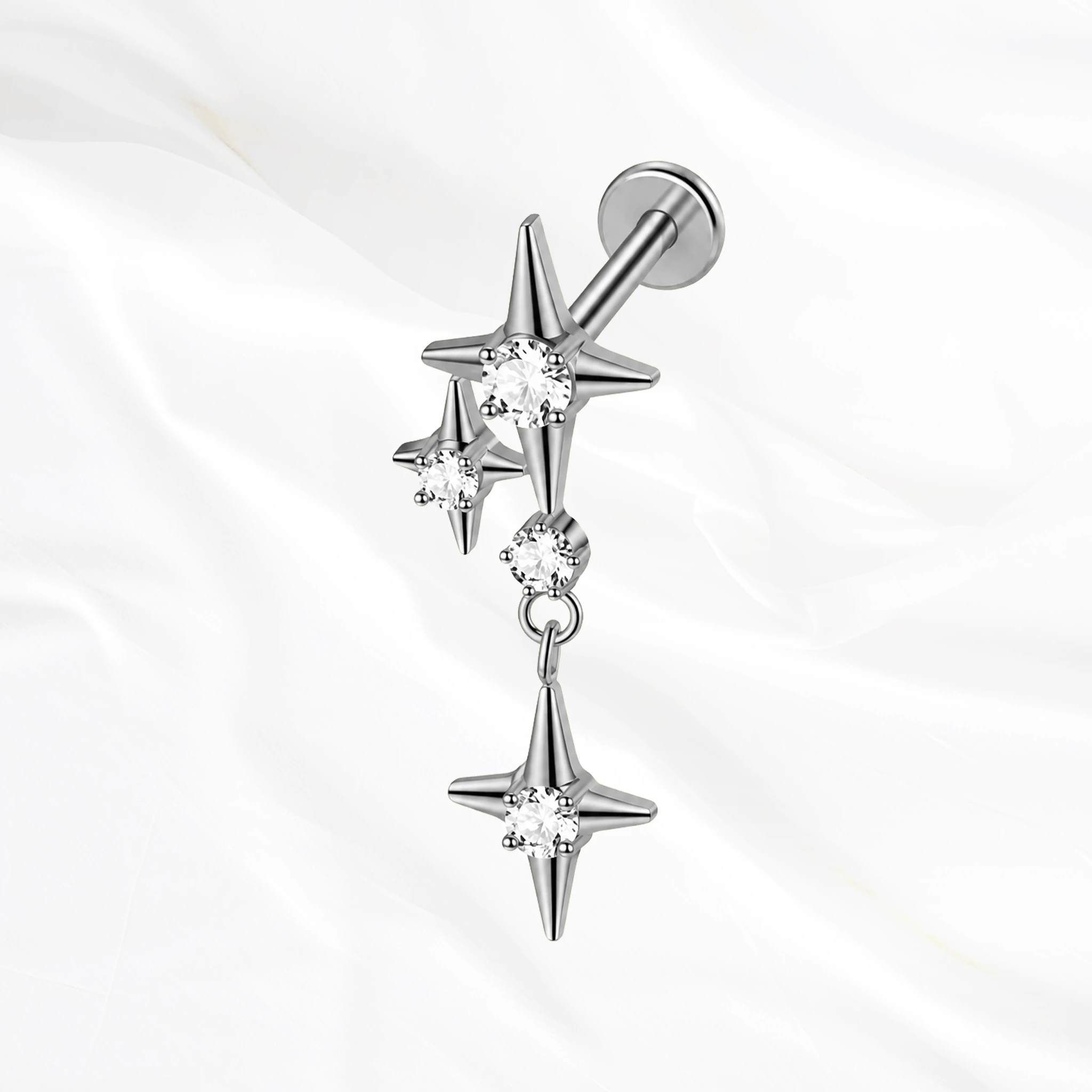Labret en titane argenté La Constellation, deux étoiles à quatre branches serties reliées par deux petites pierres
