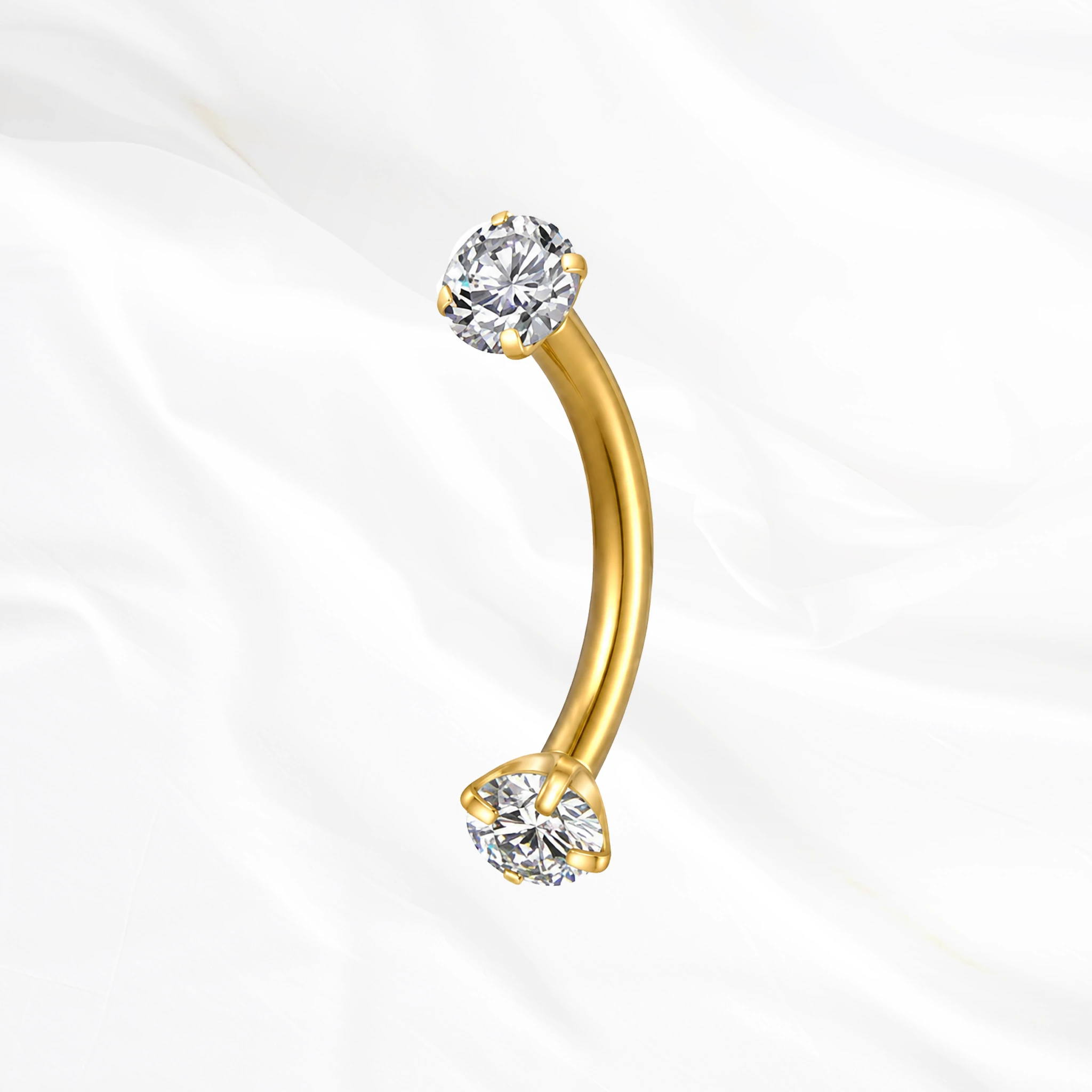 Barre courbée en titane doré La Courbe Sertie, un zircon rond serti à chaque extrémité