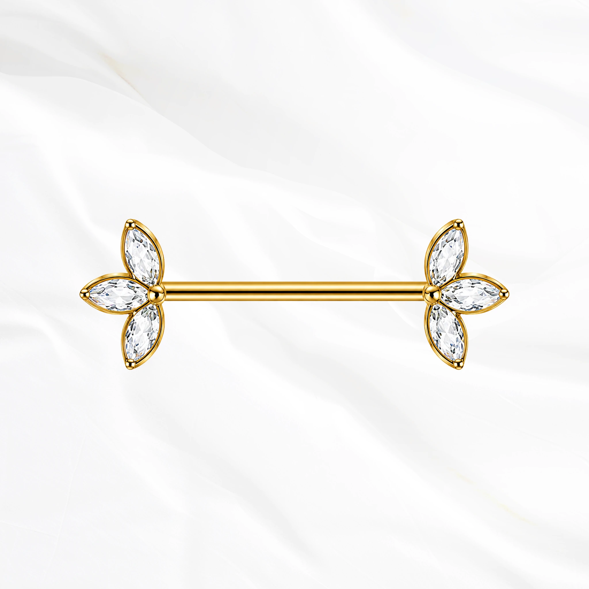 Barre droite en titane doré Le Double Trident, quatre zircons marquise ouverts en corolle à chaque extrémité