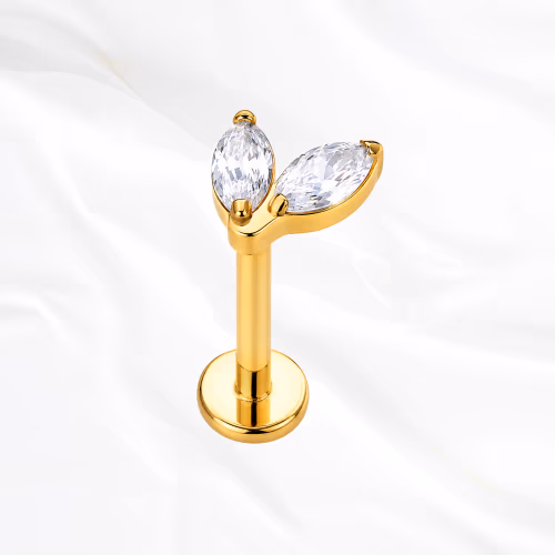 Labret en titane doré L’Épis, deux zircons marquise ouverts en V, pointes vers le bas comme deux feuilles