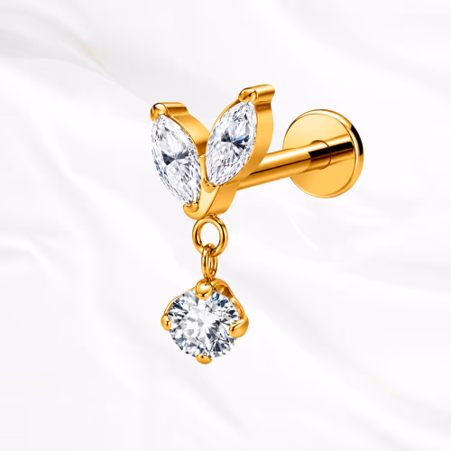 piercing labret en titane doré, deux zircons marquise et pendentif serti d'un zircon rond