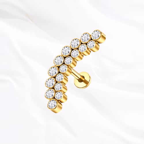 Labret en titane doré La Grande Grappe, arc pavé sur deux rangs de zircons décalés comme les grains d’une grappe