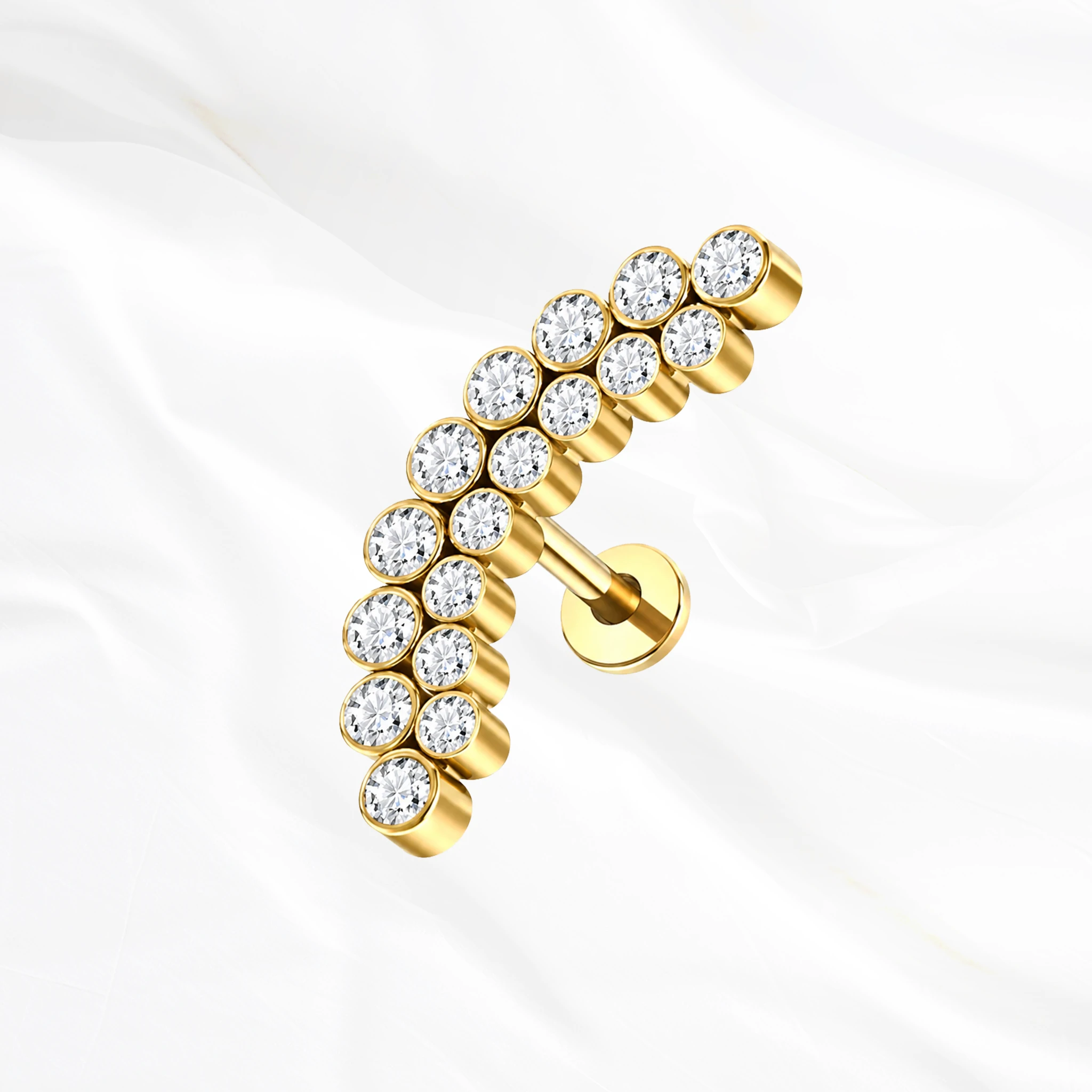 Labret en titane doré La Grande Grappe, arc pavé sur deux rangs de zircons décalés comme les grains d’une grappe