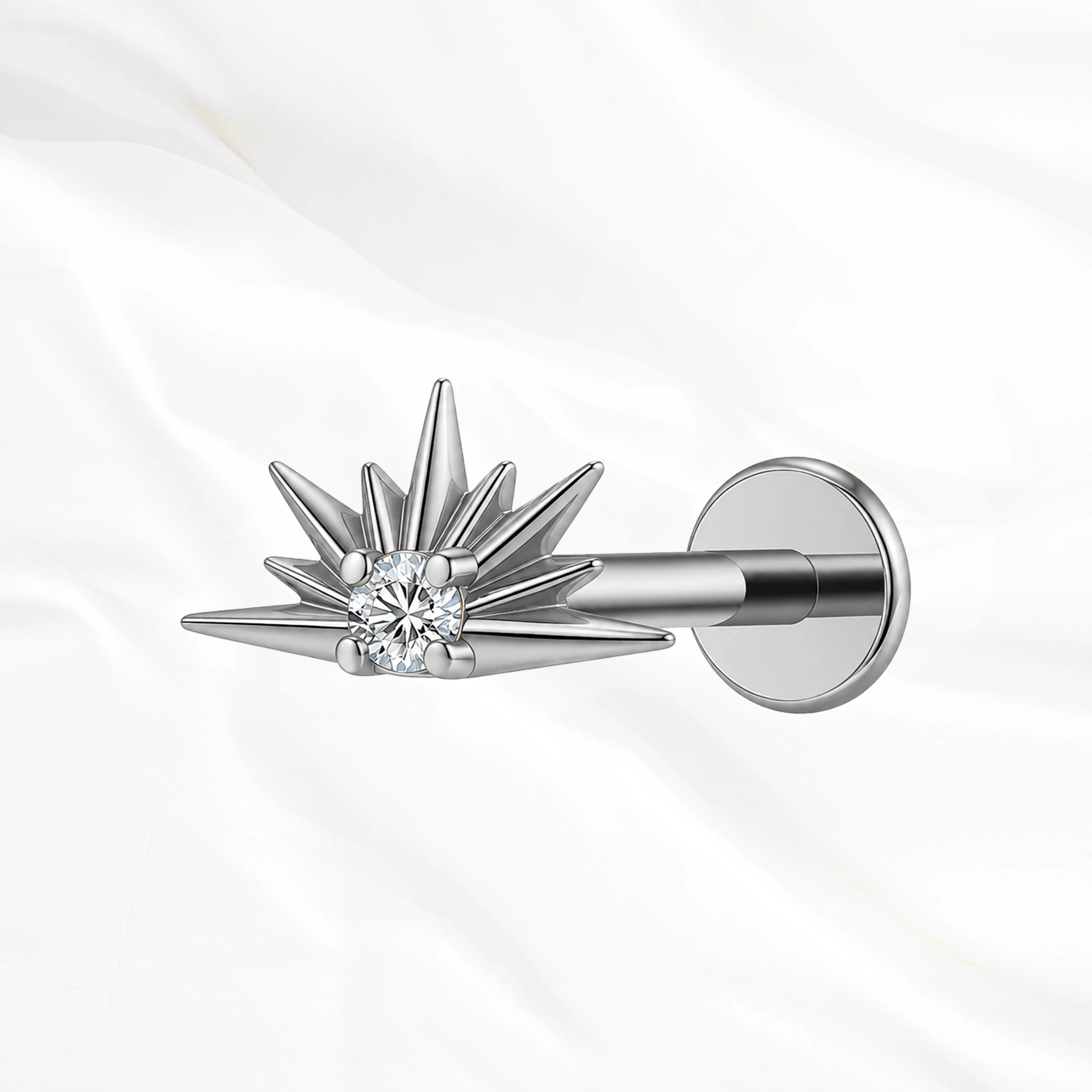 Piercing labret titane argenté "le lever du soleil" motif soleil levant rayonnant avec cristal zirconium