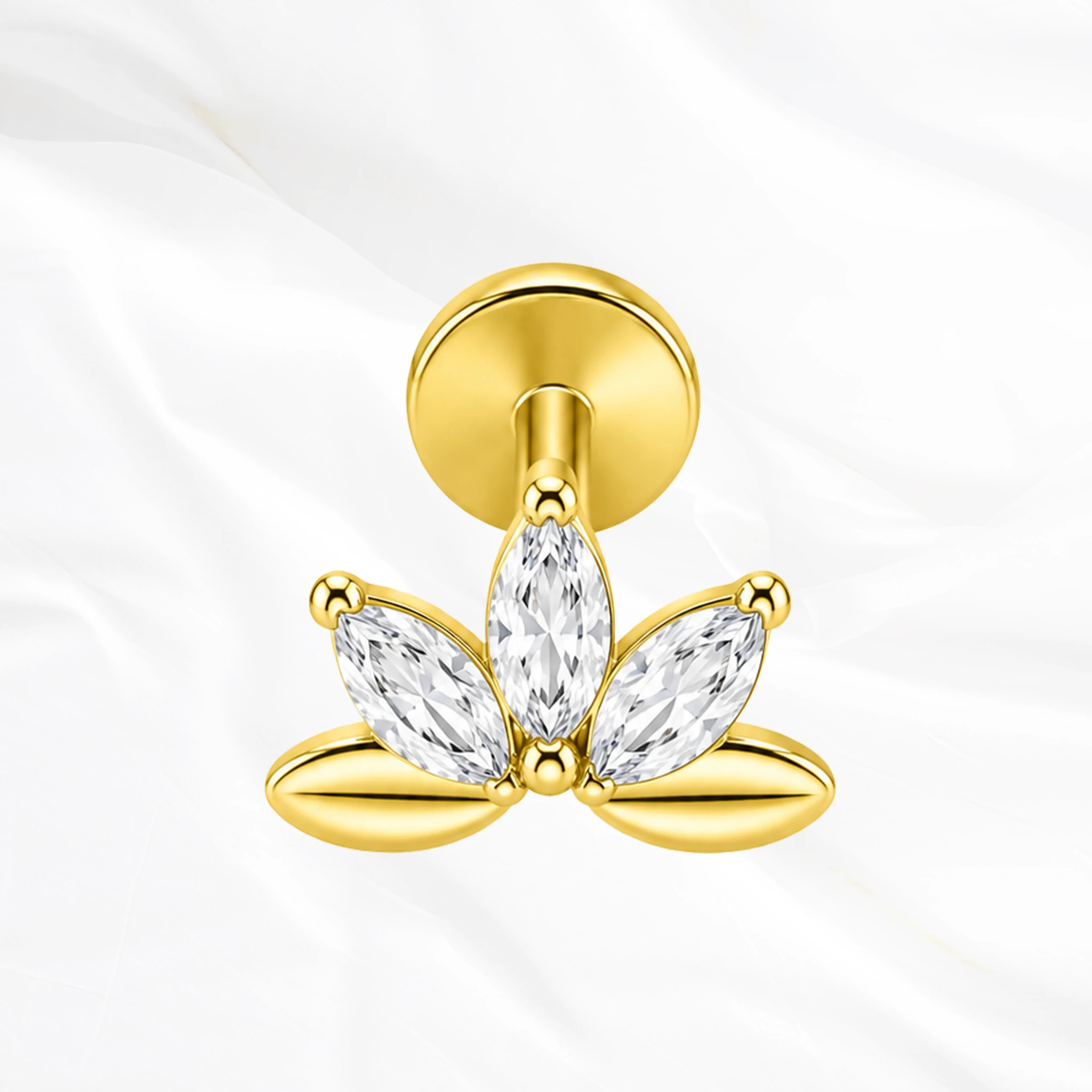 Labret push-in en titane doré Le Lotus, trois zircons marquise dressés encadrés de deux pétales en titane plein