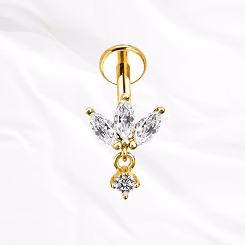 Labret en titane doré La Marquise Pendentif, trois zircons marquise en éventail sous lesquels un zircon rond se balance