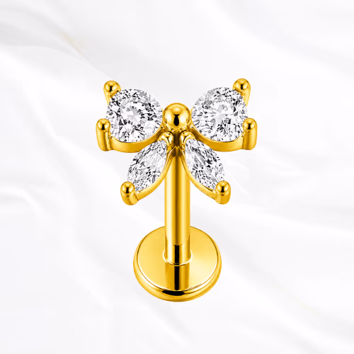 Labret push-in en titane doré Le Petit Nœud Brillant, nœud papillon formé de quatre zircons sans métal apparent