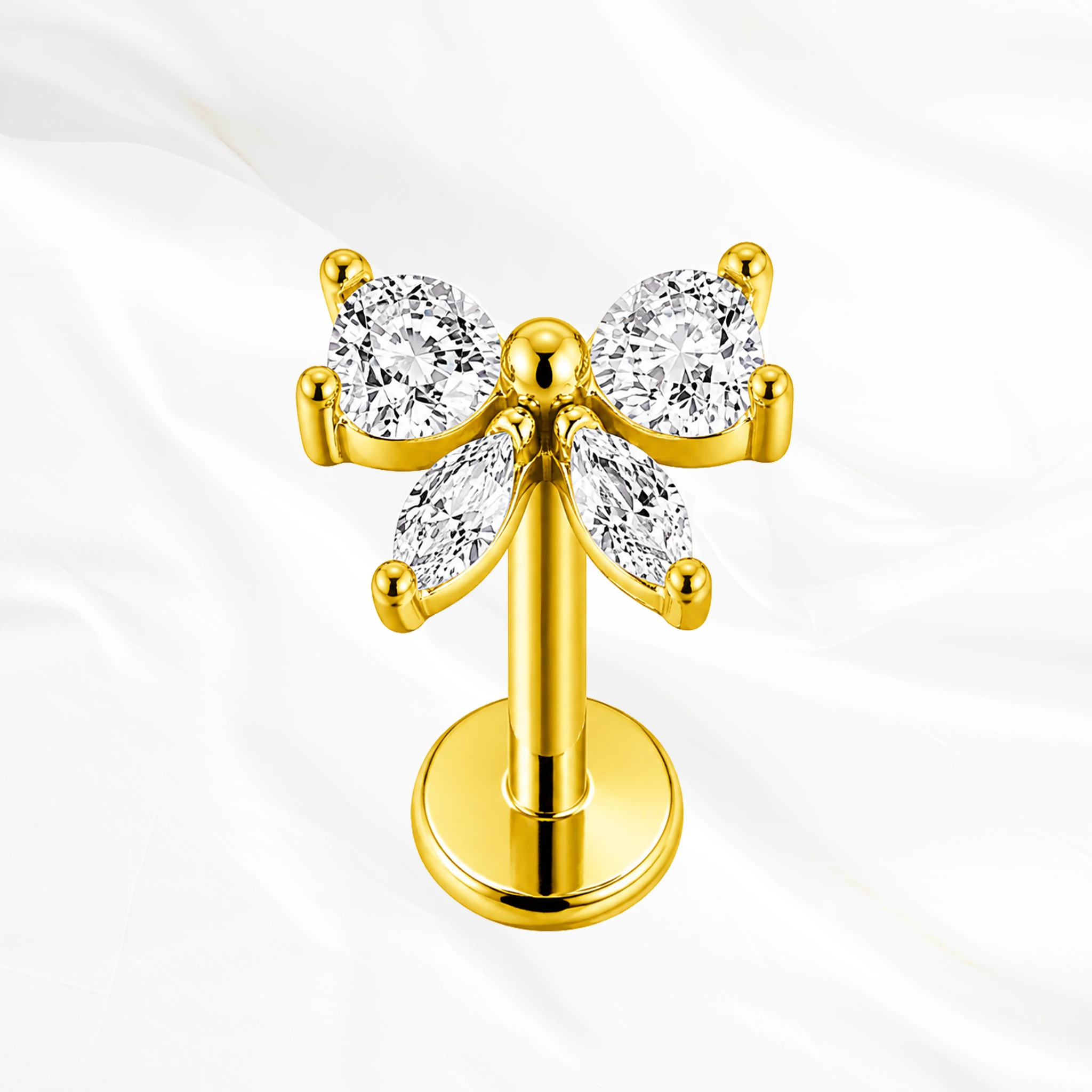Labret push-in en titane doré Le Petit Nœud Brillant, nœud papillon formé de quatre zircons sans métal apparent
