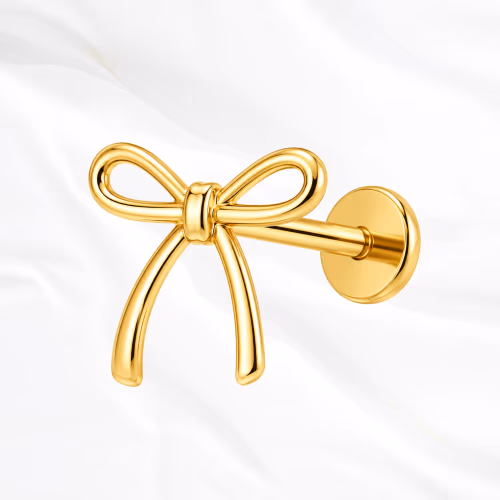 piercing labret en titane doré en forme de nœud de lacet