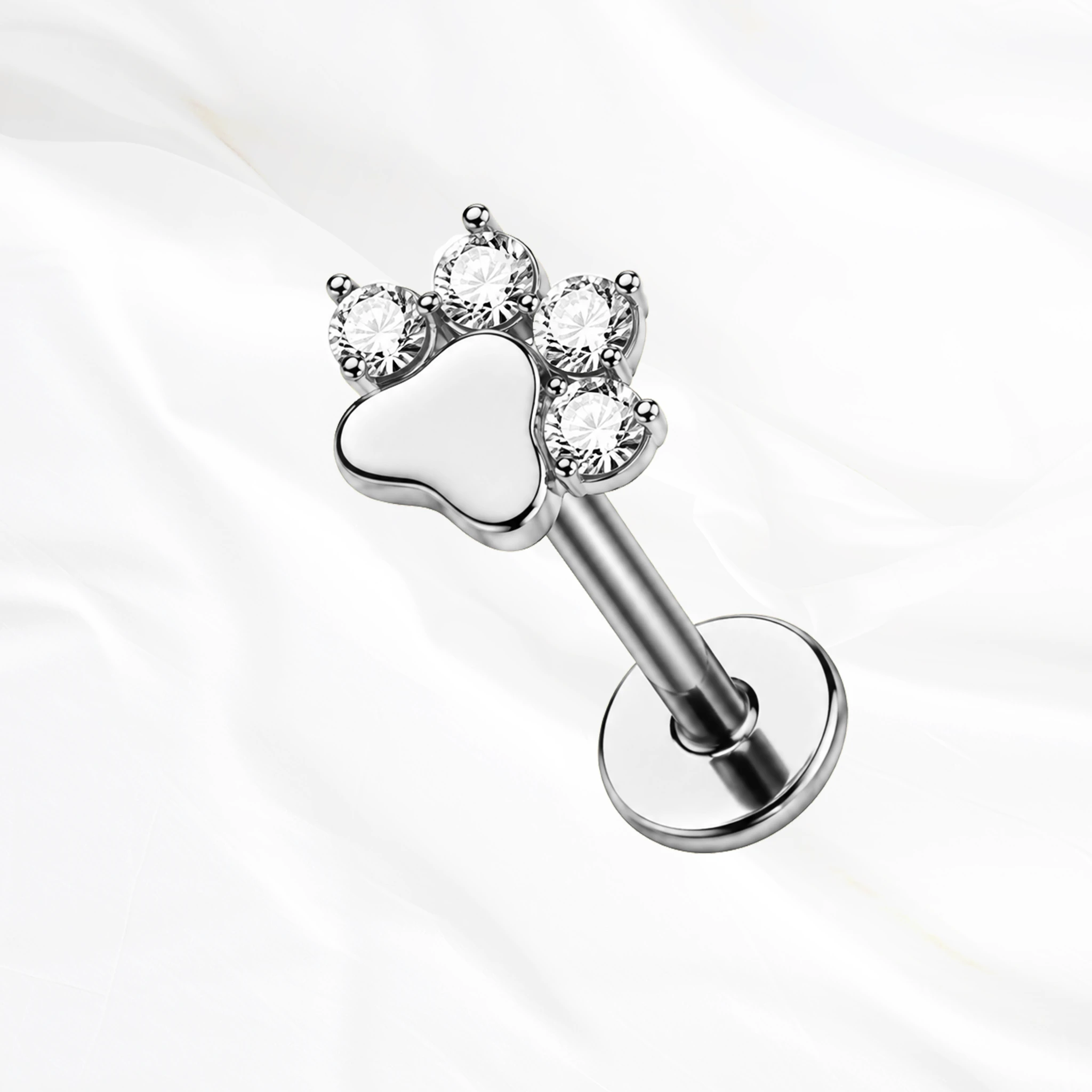 Labret push-in en titane argenté La Pattoune, empreinte de patte à coussinet plein et quatre doigts formés de zircons