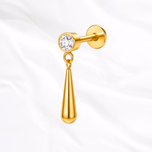 Labret en titane doré Le Pendule, zircon rond serti clos sous lequel se balance une goutte de titane pleine et polie