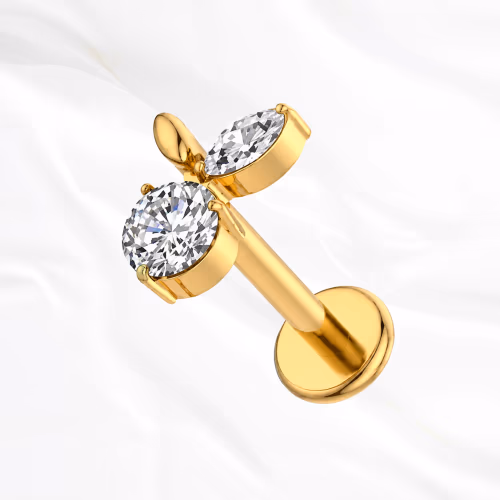 Labret en titane doré Le Petit Fruit, un zircon rond pour le fruit et un zircon marquise pour la feuille