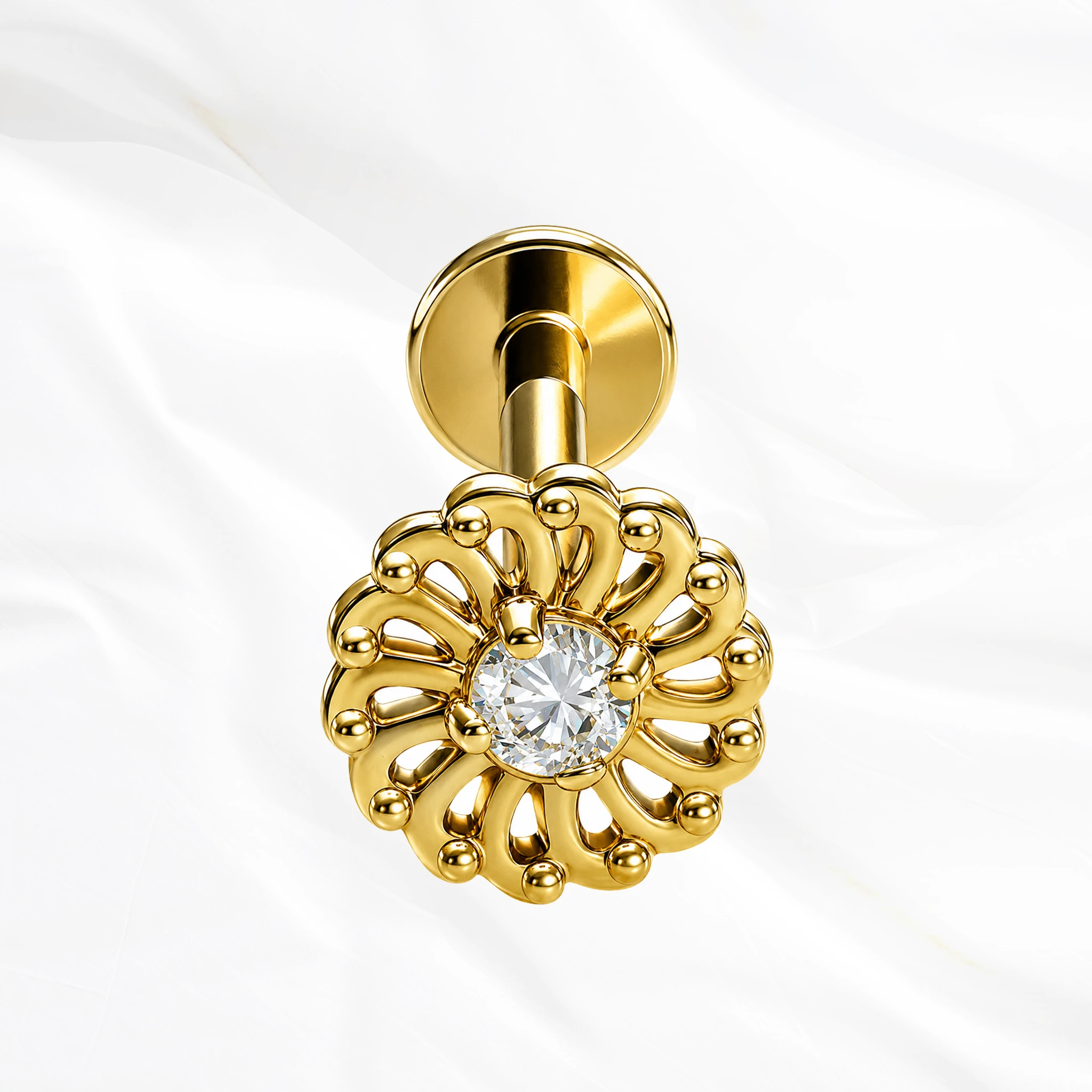 Labret push-in en titane doré La Rosace Brillante, zircon central cerné d’une couronne de pierres plus petites dans une monture perlée