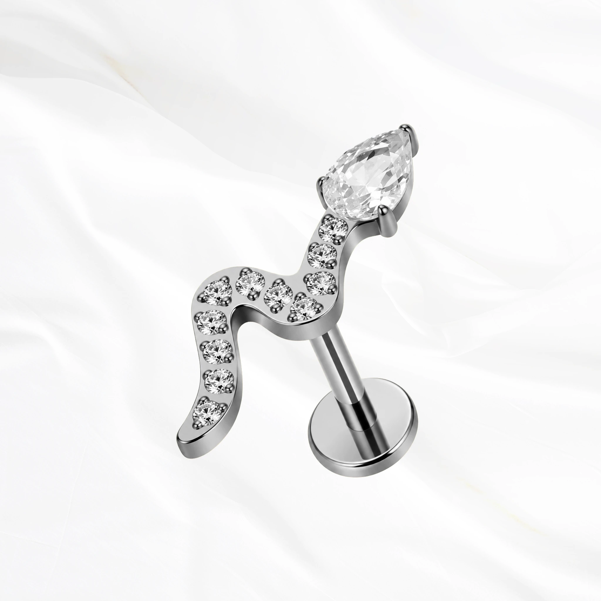 Labret en titane argenté Le Serpent V2, serpent au corps pavé de petits zircons et à la tête formée d’un zircon poire