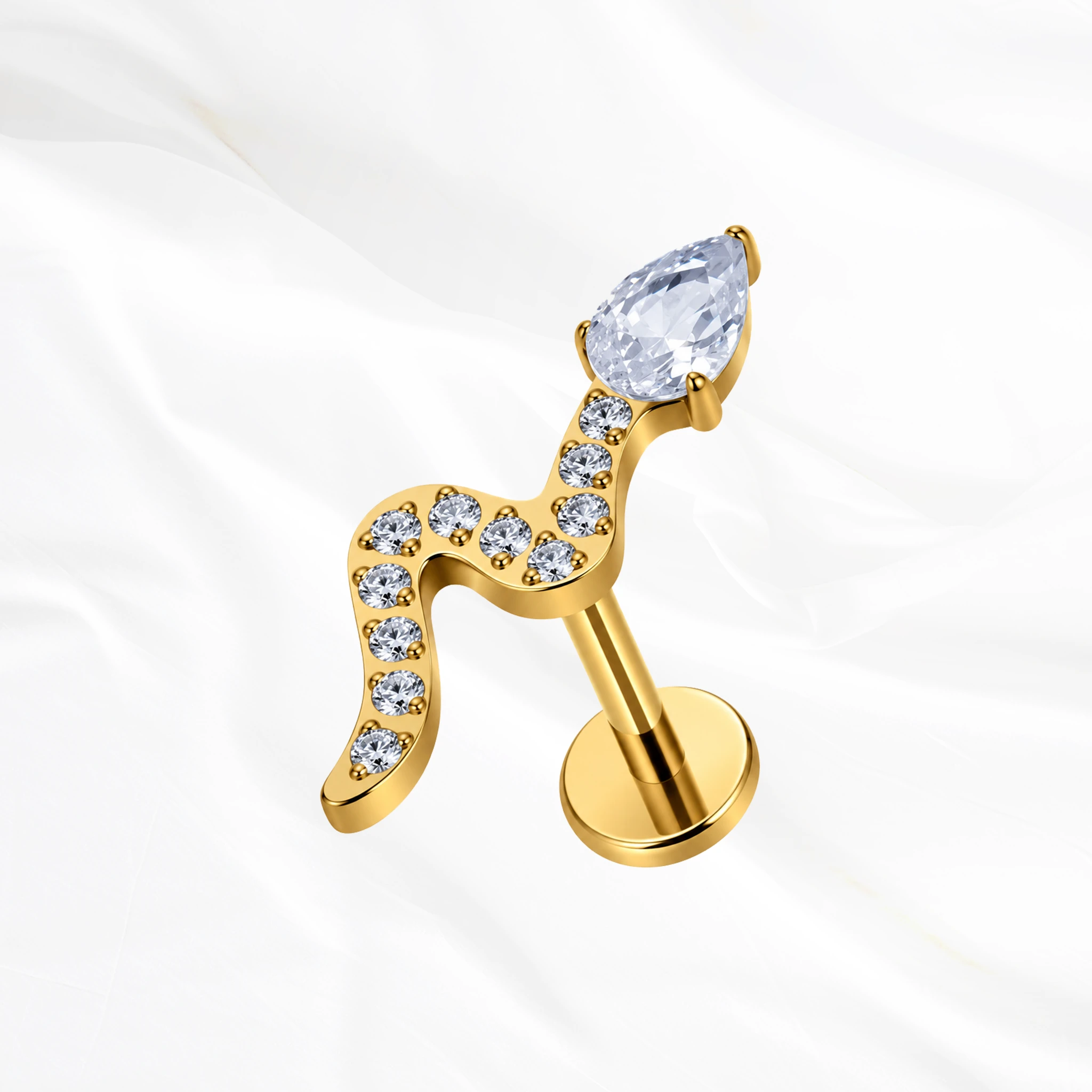 Labret en titane doré Le Serpent V2, serpent au corps pavé de petits zircons et à la tête formée d’un zircon poire
